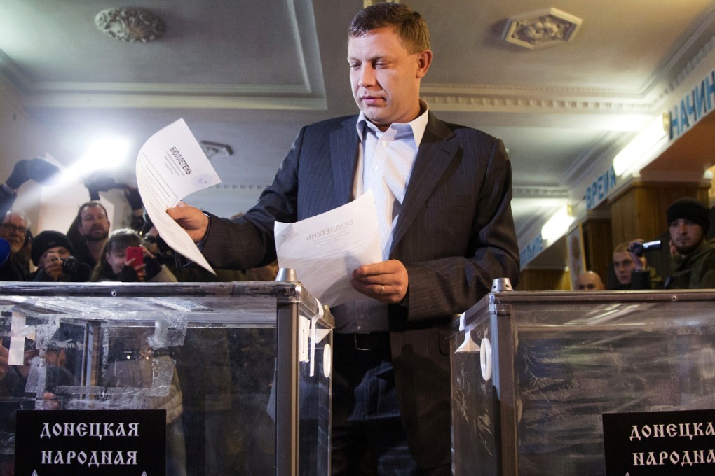 Alexander Zakharchenko casts his ballot in Donetsk. Photo: AFP
