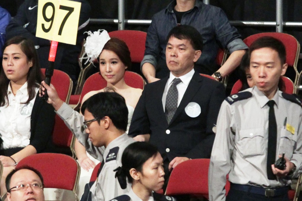 George Wong (centre), managing director of The Lifestyle Group, paid HK$570,000 for a prime spot for a snack stall. Photo: Dickson Lee