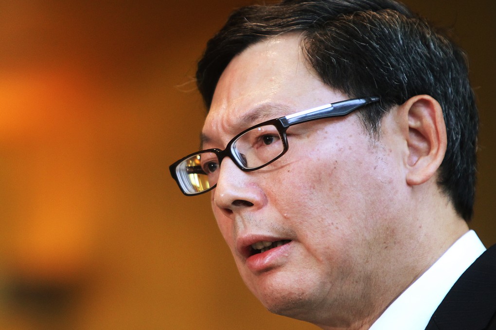 Norman Chan warned about rising personal loans, with the number of new loans doubling year-on-year in the first nine months. Photo: K.Y. Cheng