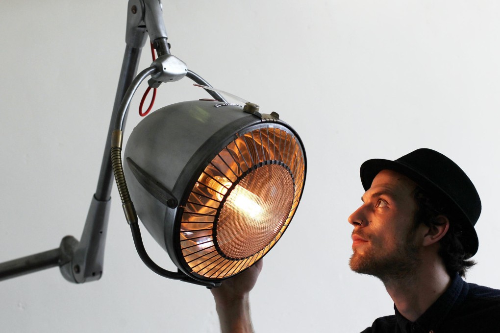 Above:Sjors van Buyten in his studio and with one of his upcycled products.
