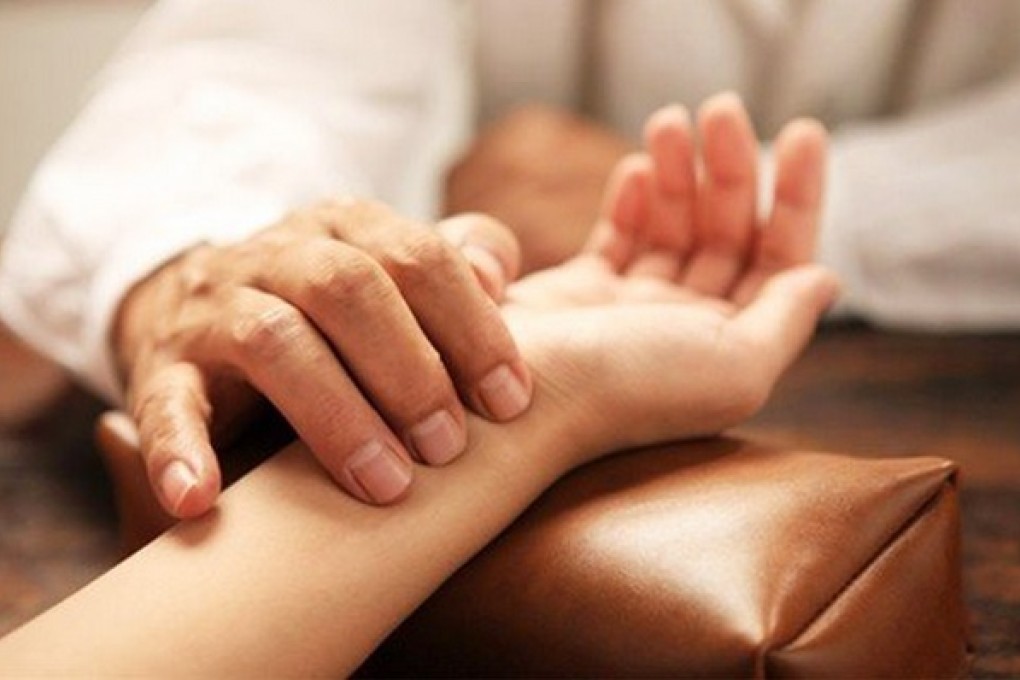 Beijing doctor Ning Fanggang pledges to give 100,000 yuan to any registered Chinese medicine doctor who is able to pass the pregnancy test using the traditional method.