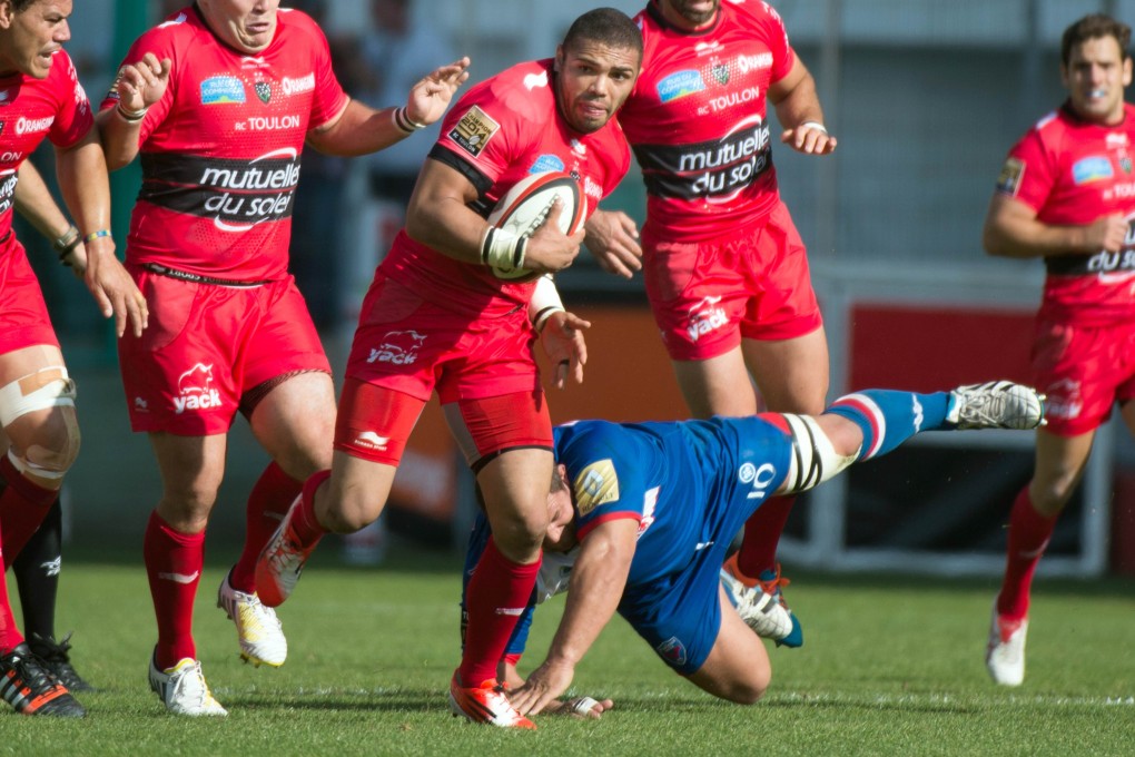 Bryan Habana, seen on the charge for Toulon against Grenoble in a French Top 14 match last weekend, is one of three players who each have more than 100 caps for South Africa. Photos: AFP