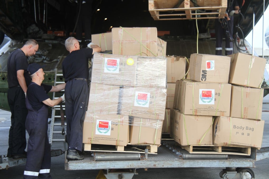 A new batch of Chinese government aid, which is used for fighting the Ebola epidemic, arrived at Abidjan, Cote d'Ivoire. Photo: Xinhua