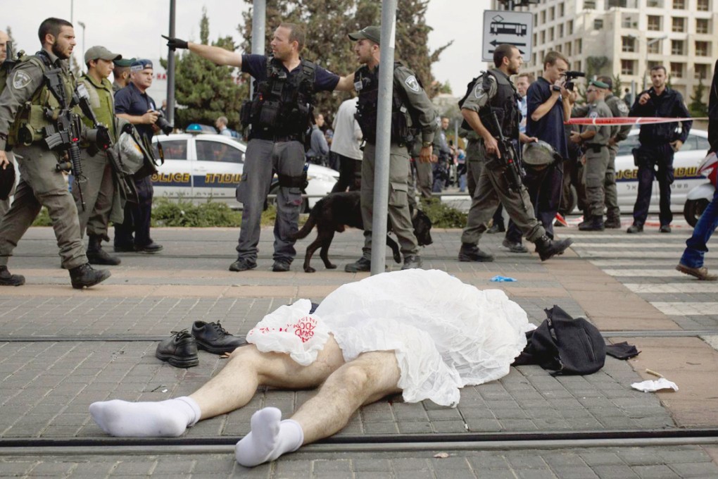 The Palestinian man, identified as Ibrahim al-Akri, was shot and killed on the tracks of the Light Rail system in East Jerusalem. Photo: EPA