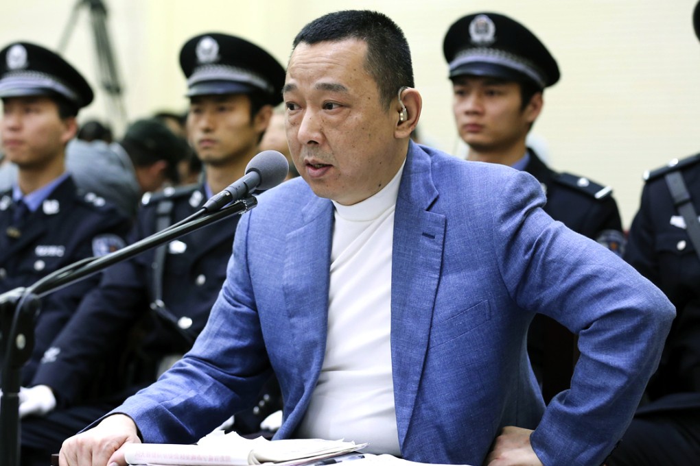 Mining tycoon Liu Han in tears at court. He has been sentenced to death after being found guilty of charges including murder and illegally selling firearms. Photo: Xinhua