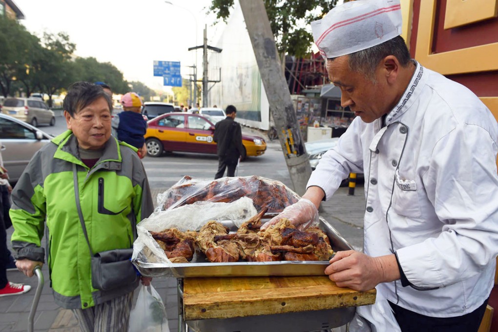 Beijing's environmental bureau faulted a restaurant selling roast duck because the kitchen's smoke exhaust system did not have a proper filter.