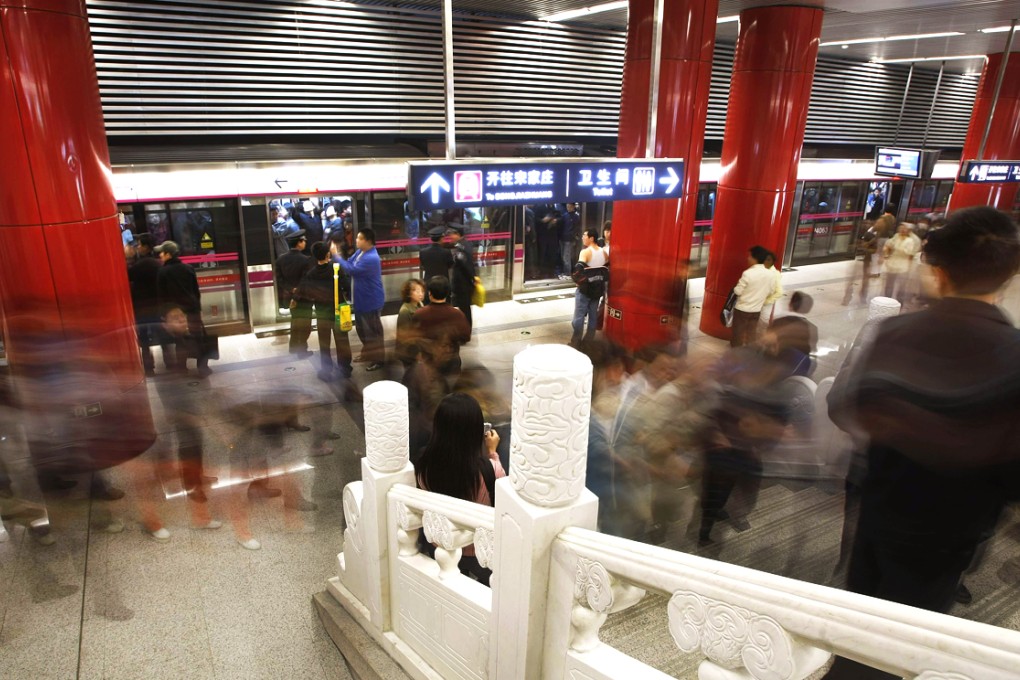 The woman was killed on Beijing Subway's Line 5 after being trapped between the two sets of doors. Photo: Reuters