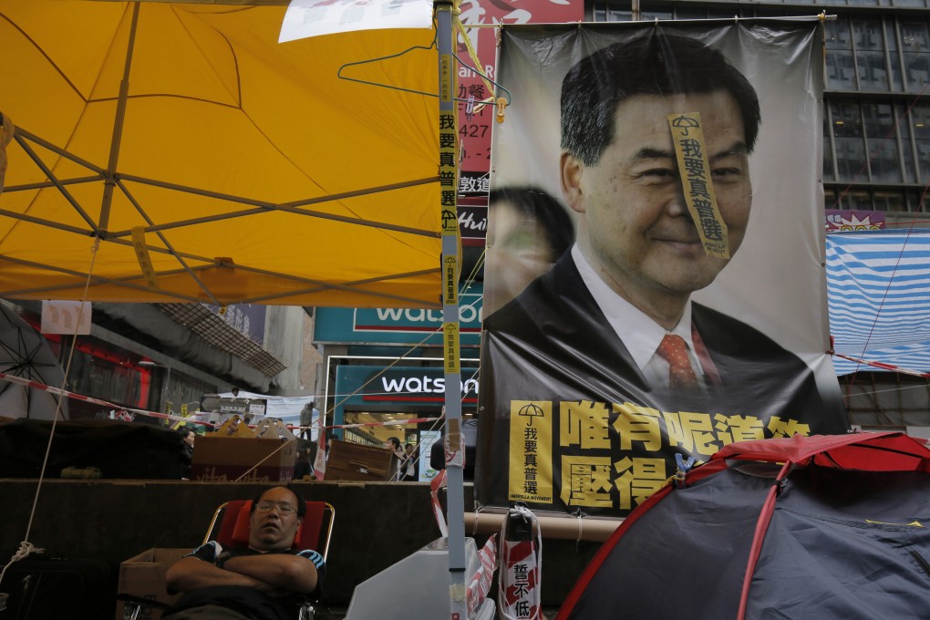 There are alternatives to the current system of mutant democracy and command from a remote leadership. They require trust in the people of Hong Kong. Photo: AP