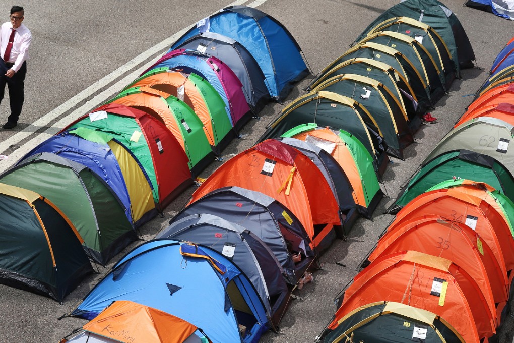 Occupy Central "has some elements of a ‘colour revolution’ and has already threatened ‘Hong Kong security’,” the two academics wrote. Photo: K.Y. Cheng