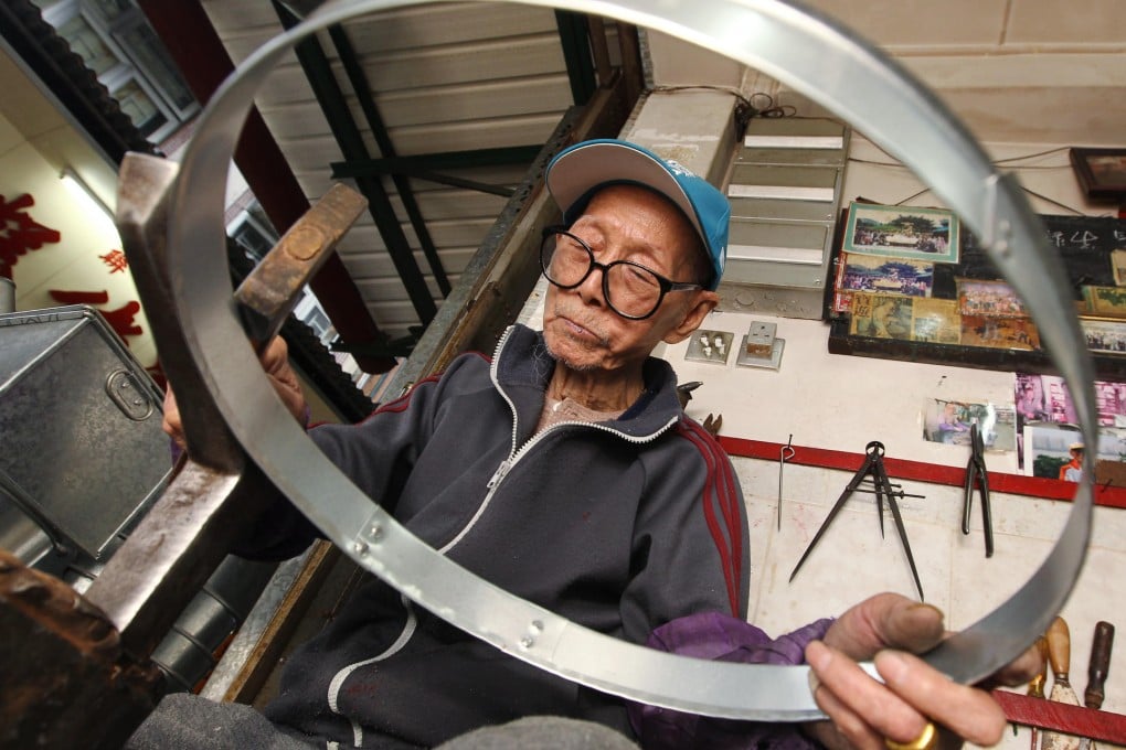 Tin man Mak Sing-yin in his shop. Photo: Edward Wong