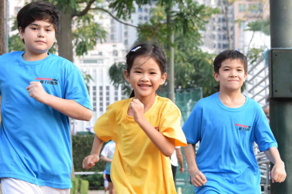 Daniel Capino (left), Celine Lo (centre) and Jeffrey Wilson prepare for tomorrow's race in Kowloon. Photo: SCMP Pictures