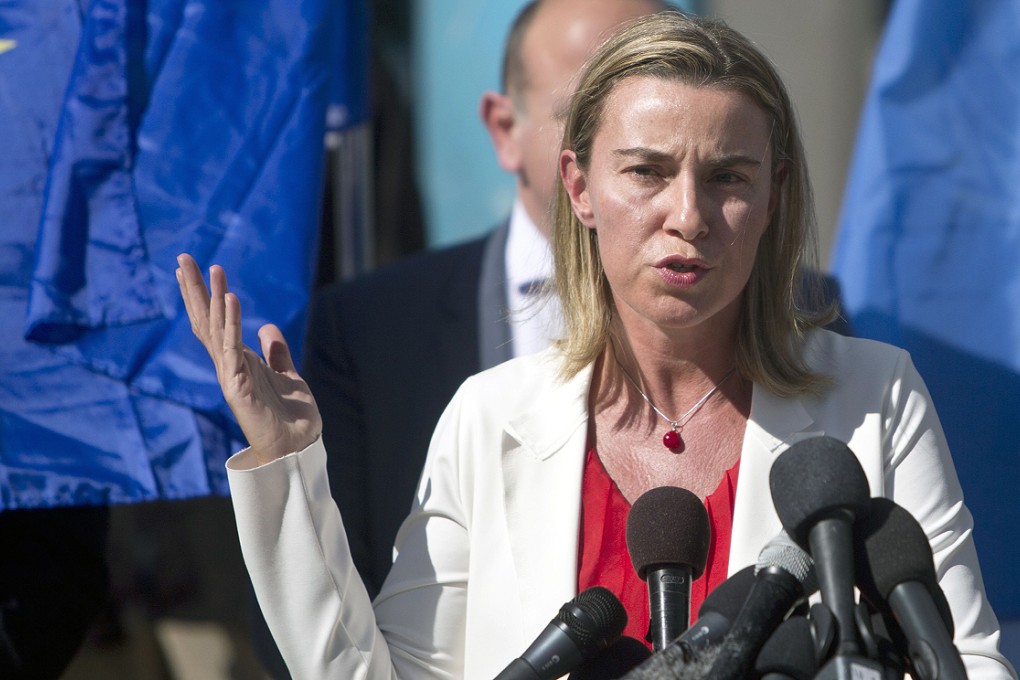 The European Union's foreign affairs chief Federica Mogherini speaks on Friday as she visits the UN-run Barhain boys school where displaced Palestinian families found refuge in Gaza City. Photo:   AFP