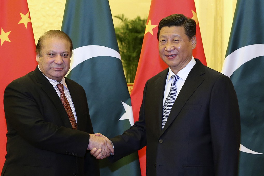 Pakistan's Prime Minister Nawaz Sharif shakes hands with China's President Xi Jinping during their meeting on Saturday in Beijing. Photo: Xinhua