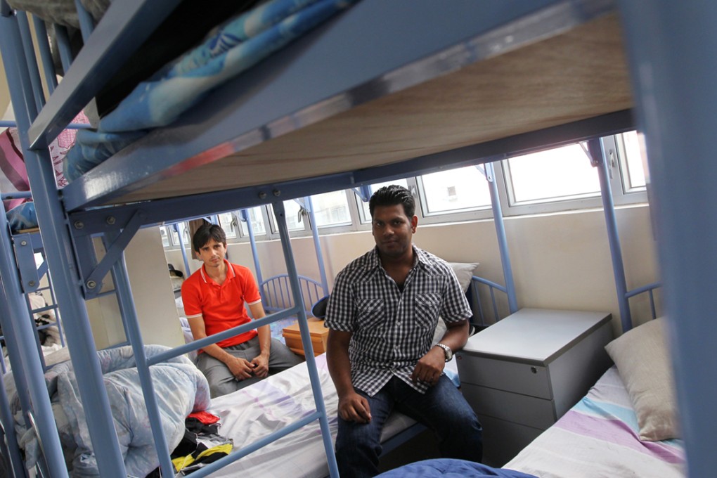 Revamped screening system has dealt with just 504 asylum seekers since March, with 9,500 waiting.