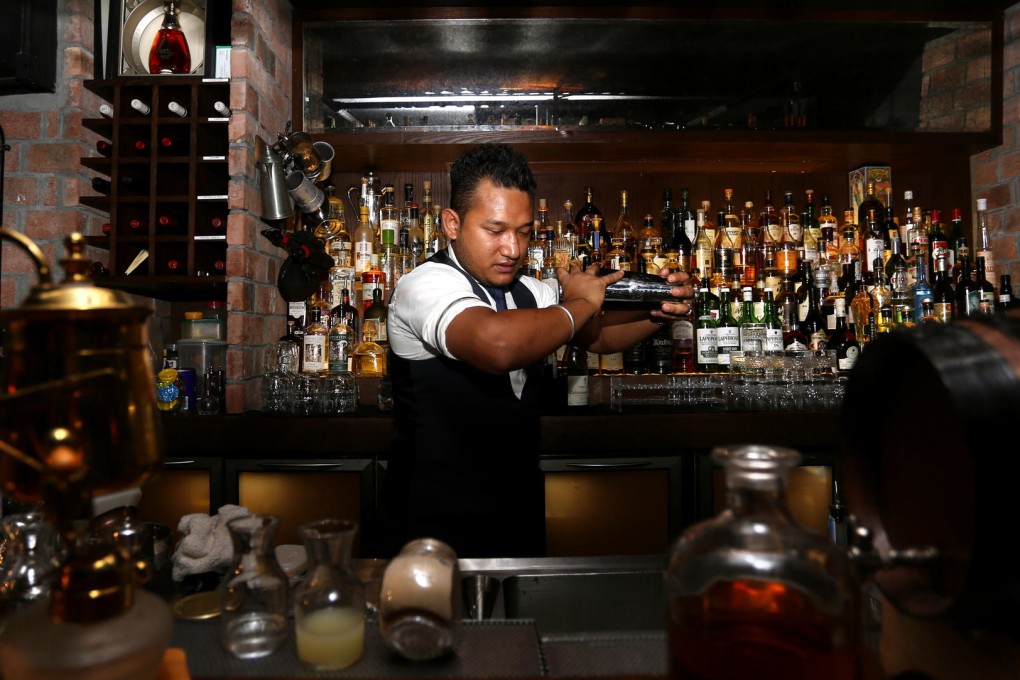 Bar manager Suraj Gurung says All whiskies have their own character and suit everyone's palate. Photos: Jonathan Wong