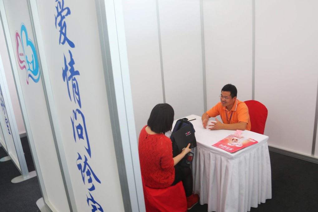 Singles talk at a mass matchmaking event before Singles Day in Shanghai last year.