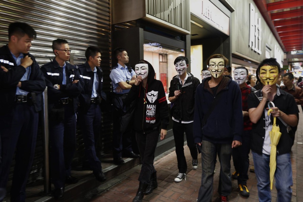 Protesters are hiding behind masks. Photo: Reuters