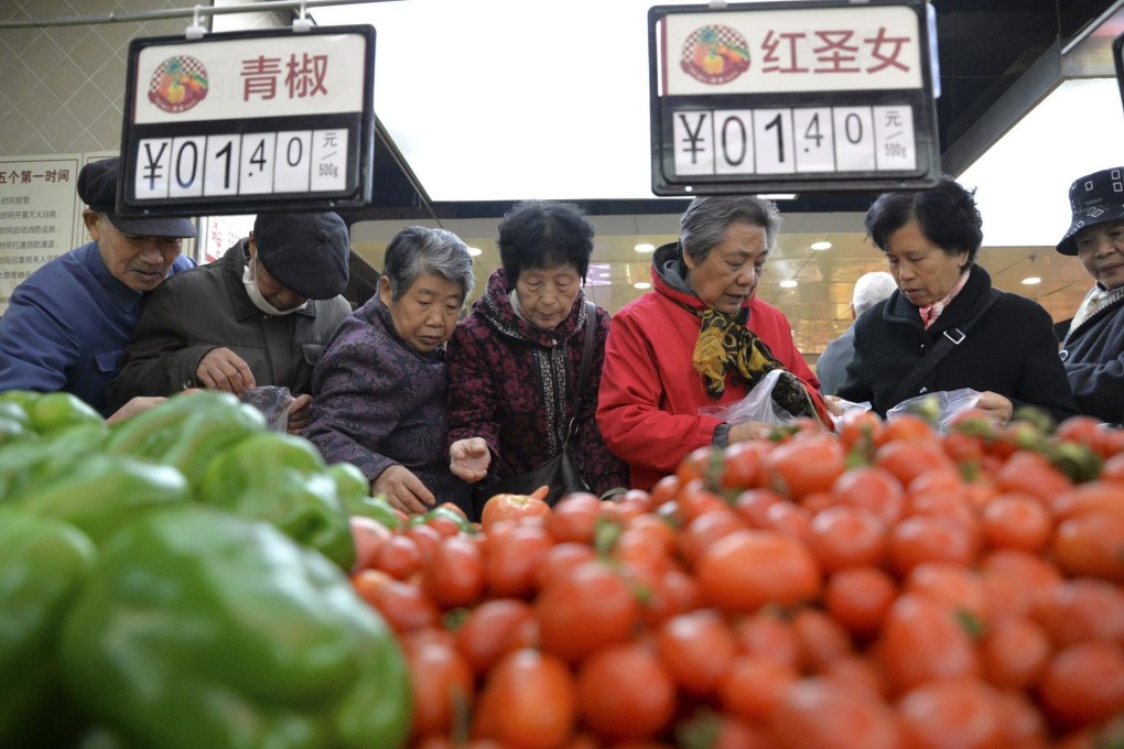 The mainland's annual consumer inflation stayed near a five-year low in October, further evidence of an economic slowdown. Photo: Reuters
