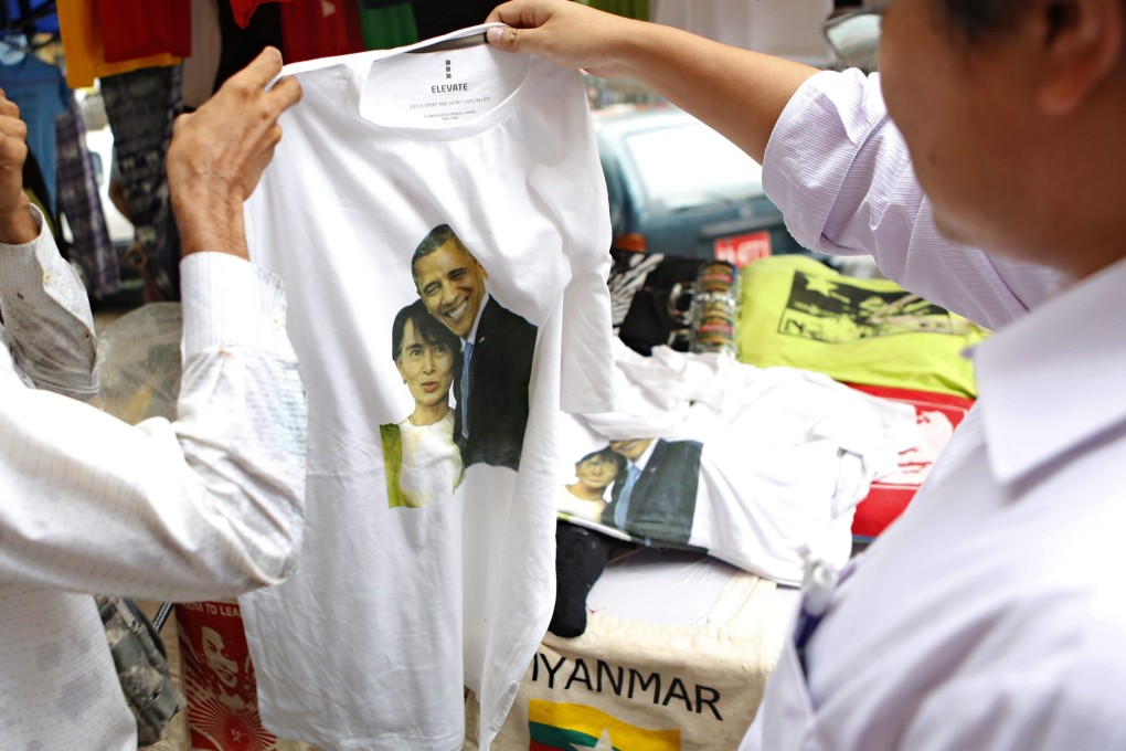 A T-shirt featuring the picture of US President Barack Obama and Myanmar opposition leader Aung San Suu Kyi at a shop in Yangon. Obama is expected at the upcoming East Asia Summit hosted by Myanmar. Photo: EPA