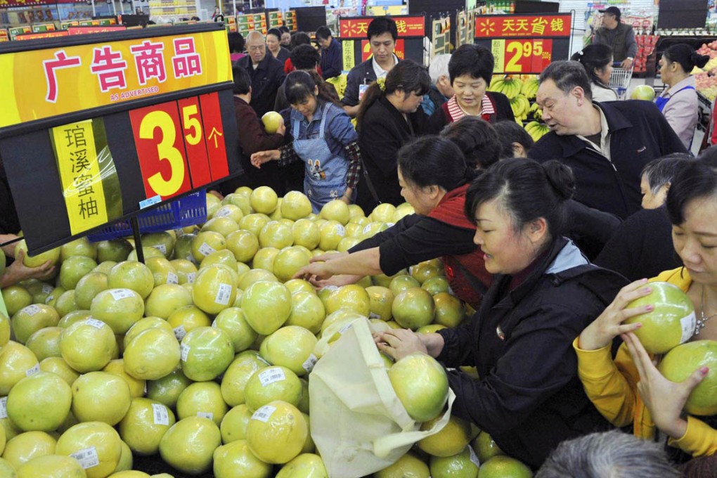 Wal-Mart plans to spend 300 million yuan on food safety in China in the three years to 2015, up from 100 million yuan. Photo: Reuters