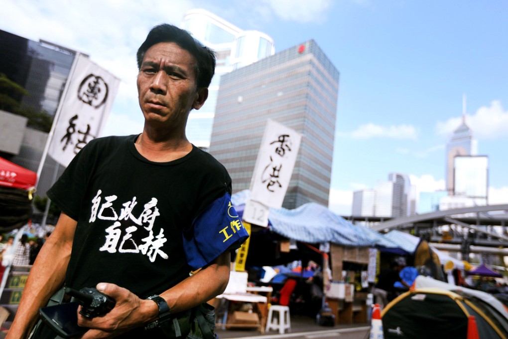Marshal leader Alex Kwok has slept at the Admiralty site since the protest started. Photo: Sam Tsang