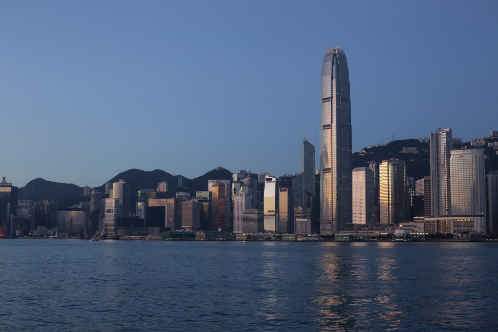 The IFC Tower gleams in the sunlight in Hong Kong's business district as property sector in the city braces for impact of plan to connect the Shanghai and Hong Kong stock markets being launched November 17. Photo: Bloomberg