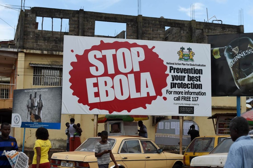 A billboard with a message about Ebola. Photo: AFP