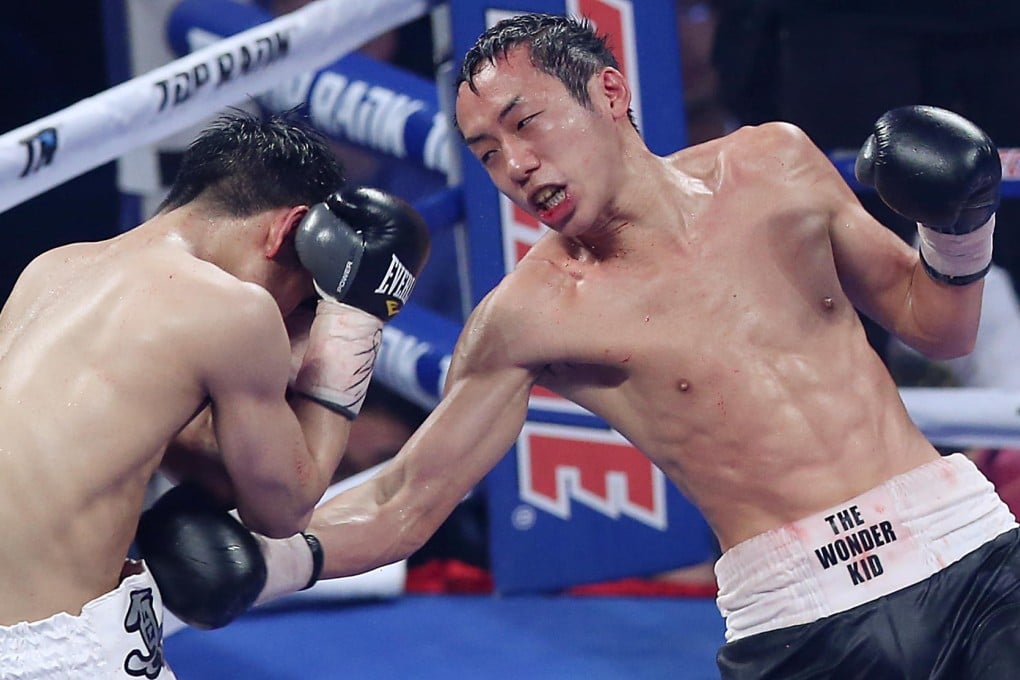 Hong Kong's only professional boxer Rex Tso Sing-yu lands a punch on  Japan’s Mako Matsuyama in February in Macau. Photo: K. Y. Cheng