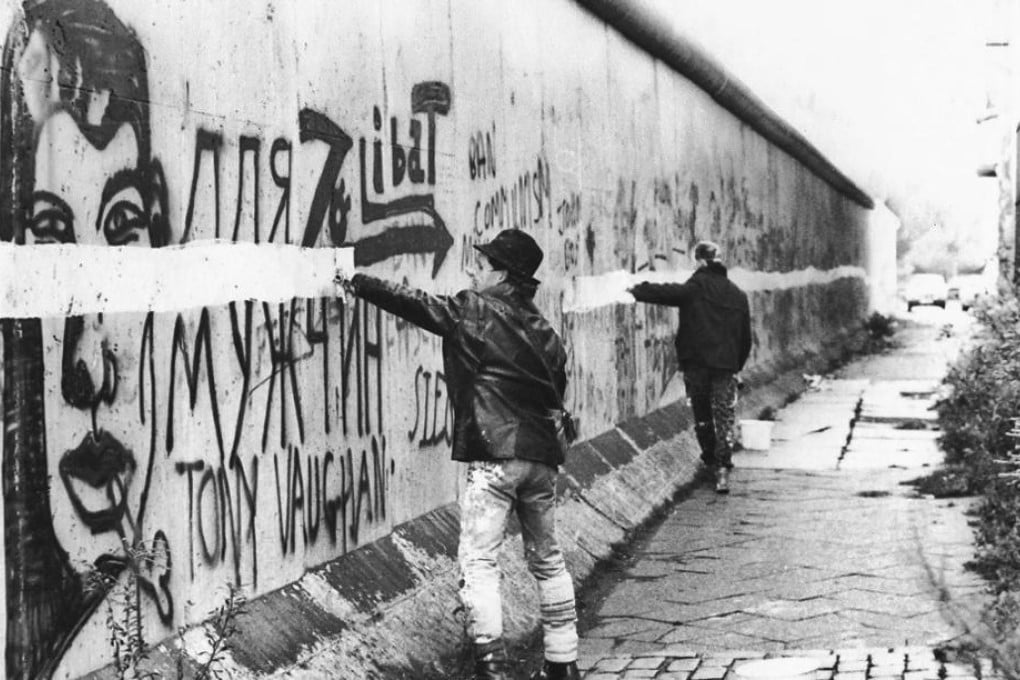 The white line is painted on the Berlin Wall almost exactly three years before the edifice's collapse.