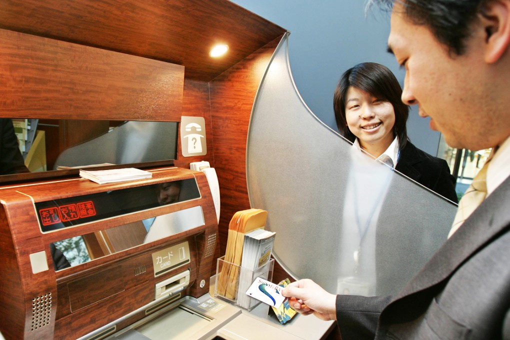 One of the women would kiss the unsuspecting men as they used an ATM machine, while her accomplice rifled through his wallet or used his bank card. Photo: AFP