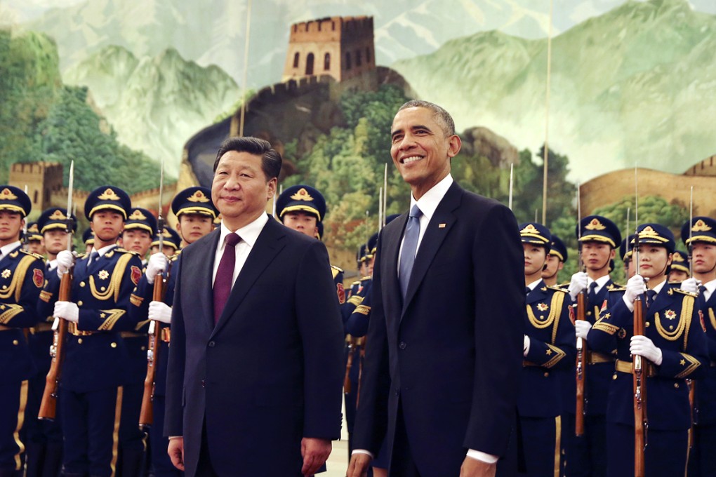 Chinese President Xi Jinping and US President Barack Obama in the Great Hall of the People in Beijing during this week's Asia-Pacific Economic Cooperation Summit. Photo: AP