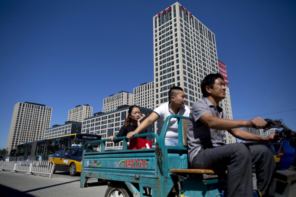 Moody's expects mainland contracted property sales to fall 5 per cent next year, better than a previous forecast. Photo: Bloomberg