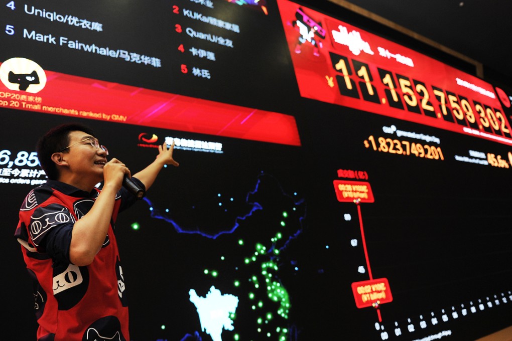 A large screen in Alibaba's headquarter in Hangzhou keeps updating the latest sales volume of Tmall, an online marketplace of the e-commerce giant. Photo: Xinhua