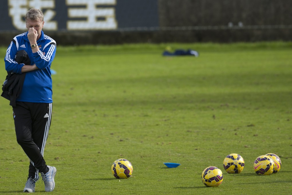 Real Sociedad coach David Moyes stands with coloured balls during a training session. Photo: AP