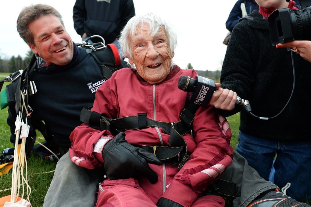 Eleanor Cunningham smiles after safely landing with tandem master Dean McDonald at Saratoga Skydiving Adventures in Gansevoort, N.Y., a day after her 100th birthday. Photo: AP