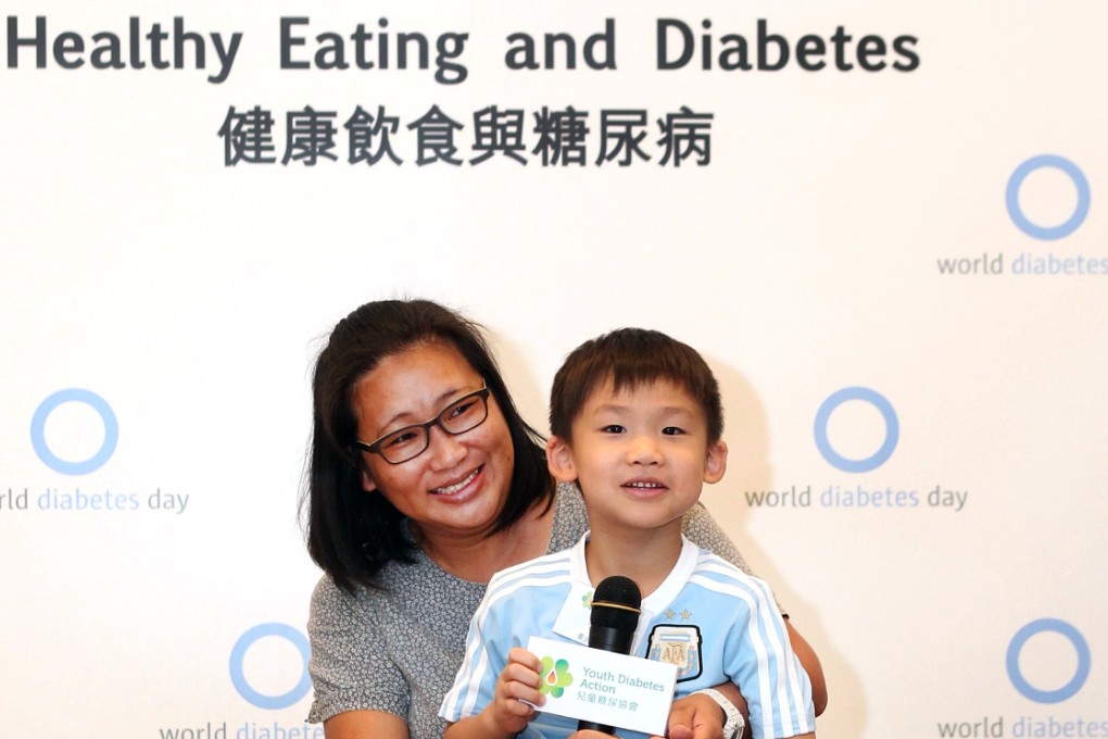 Keavin Ho and his mother Wong Lo-ming. Photo: SCMP Pictures
