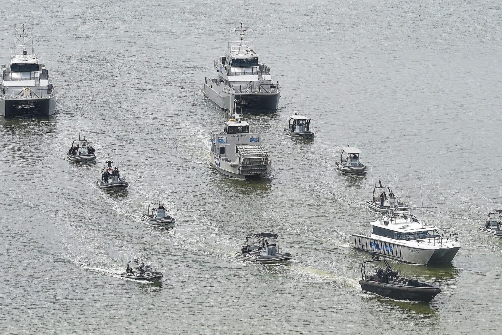 Police boats on patrol in the Brisbane River. Photo: EPA