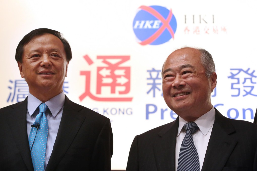 HKEx chief Charles Li Xiaojia and chairman Chow Chung-kong are keen to see Stock Connect trading after a delay. Photo: Sam Tsang