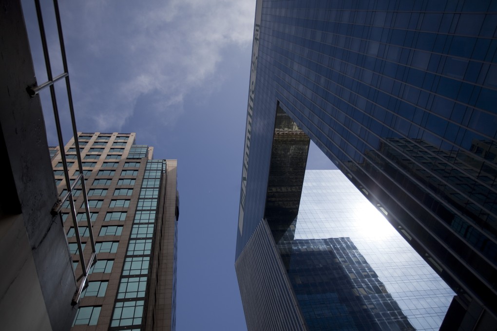 The Manulife Financial Centre stands in Hong Kong. The Canadian company said net income rose 6.4 per cent, largely on the strength of its Asian business. Photo: Bloomberg