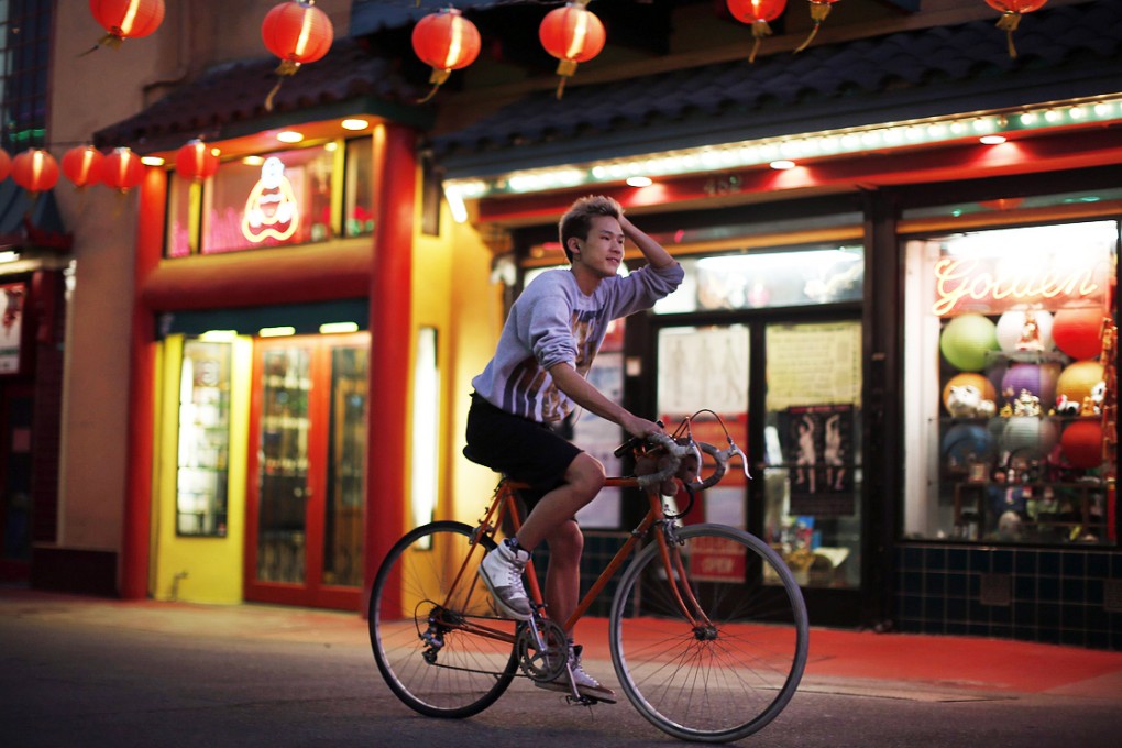 A man cycles through Chinatown in Los Angeles, California. Los Angeles is a culturally thriving city and one of the most ethnically diverse in the United States, with a population that is 48.5 percent Latino and 11.3 percent Asian, according to a 2010 census. Photo: Reuters