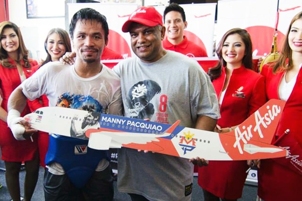 Manny Pacquiao with Air Asia CEO Tony Fernandes. Photo: SCMP Pictures