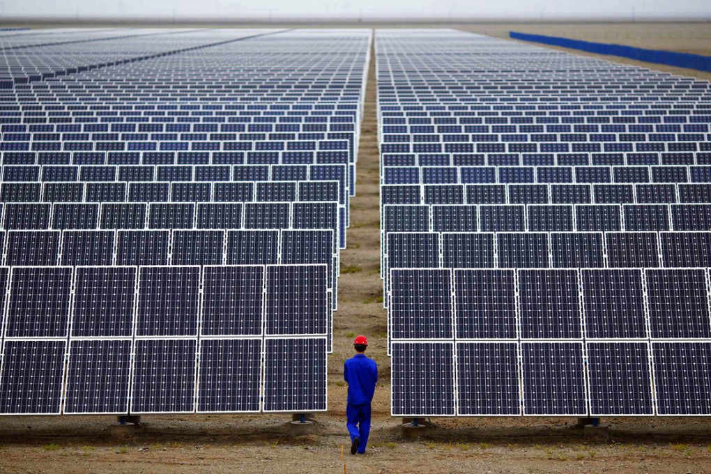Rooftop panels will supplement solar farms like this one in Gansu province. Photo: Reuters