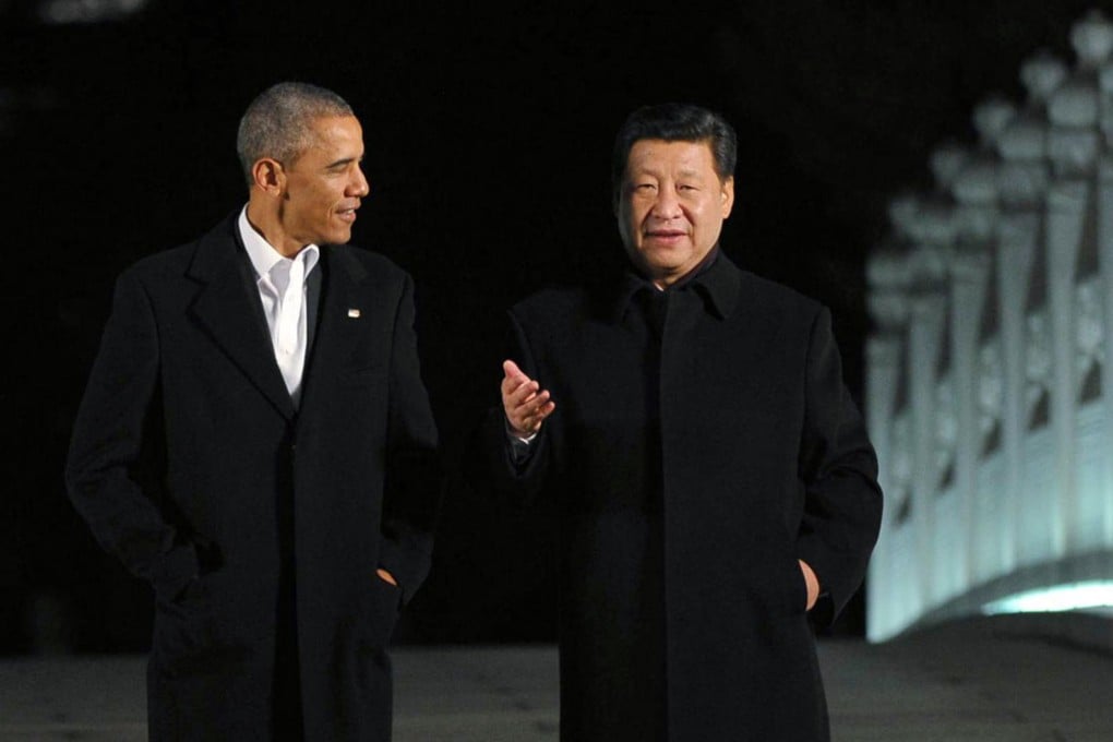 US President Barack Obama and President Xi Jinping during their walk. Photo: AP