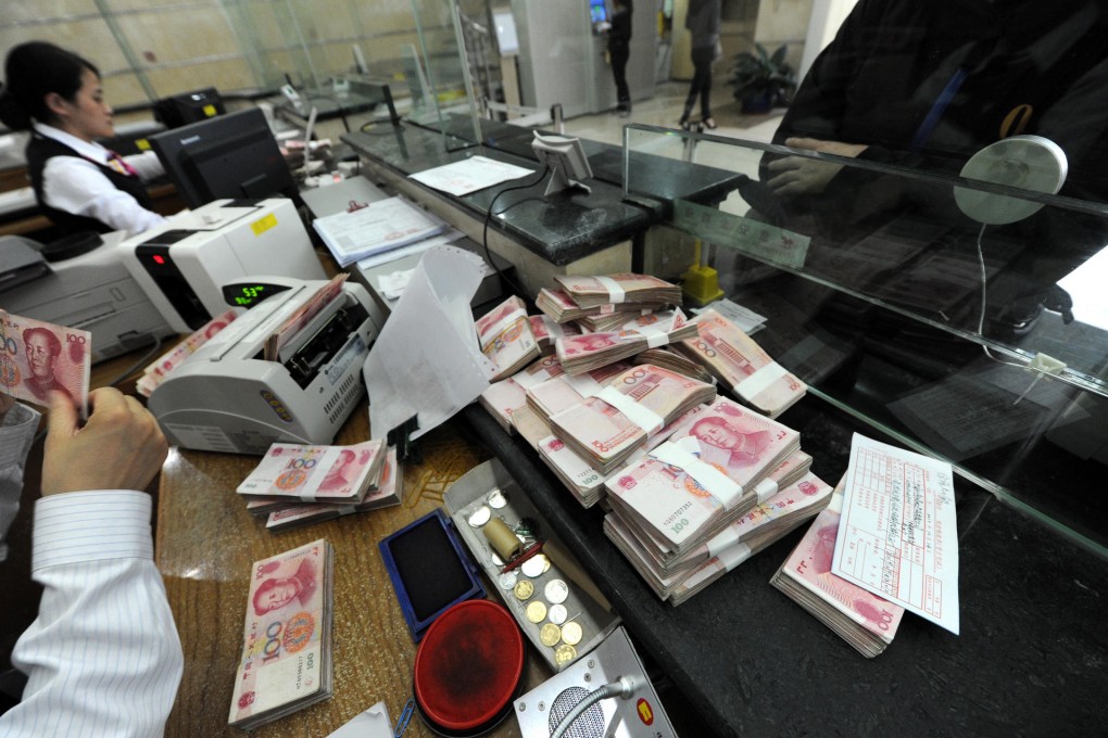 Bank loans rose less than expected to 548.3 billion yuan last month, sparking calls for more broad-based policy easing. Photo: AFP