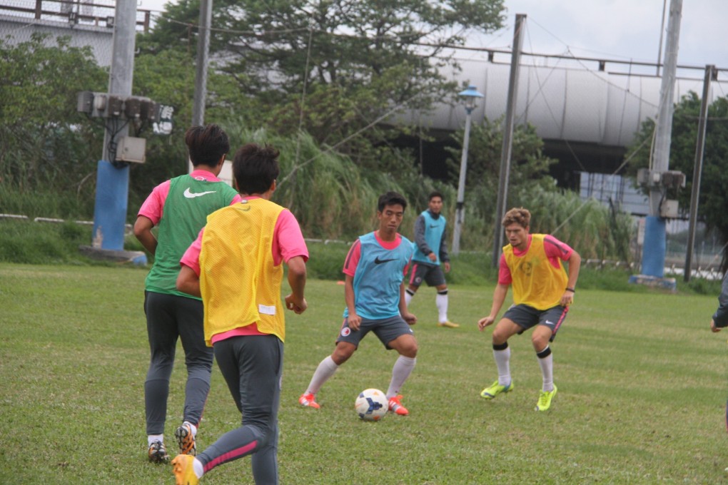Lam Ka-wai trains with Jaimes McKee before taking on Taiwan in the East Asian Cup qualifier. Photo: Chan Kin-wa