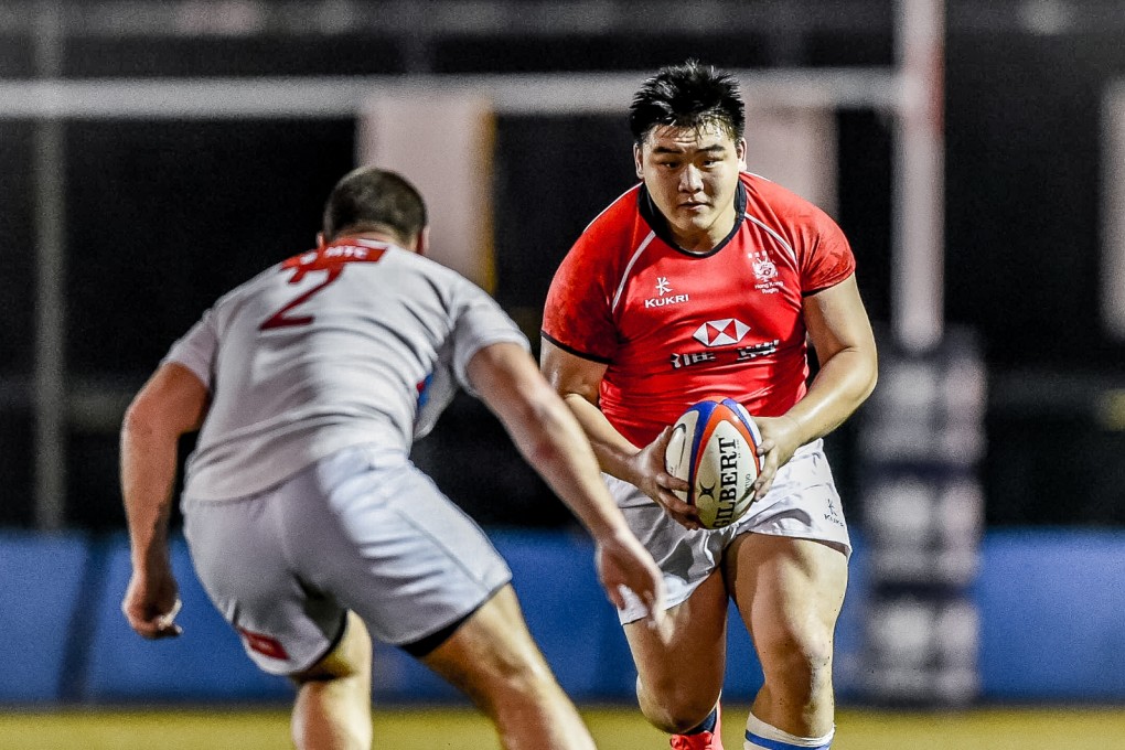 Leon Wei Hon-sum takes the ball into contact against Russia last week. Photos: HKRFU