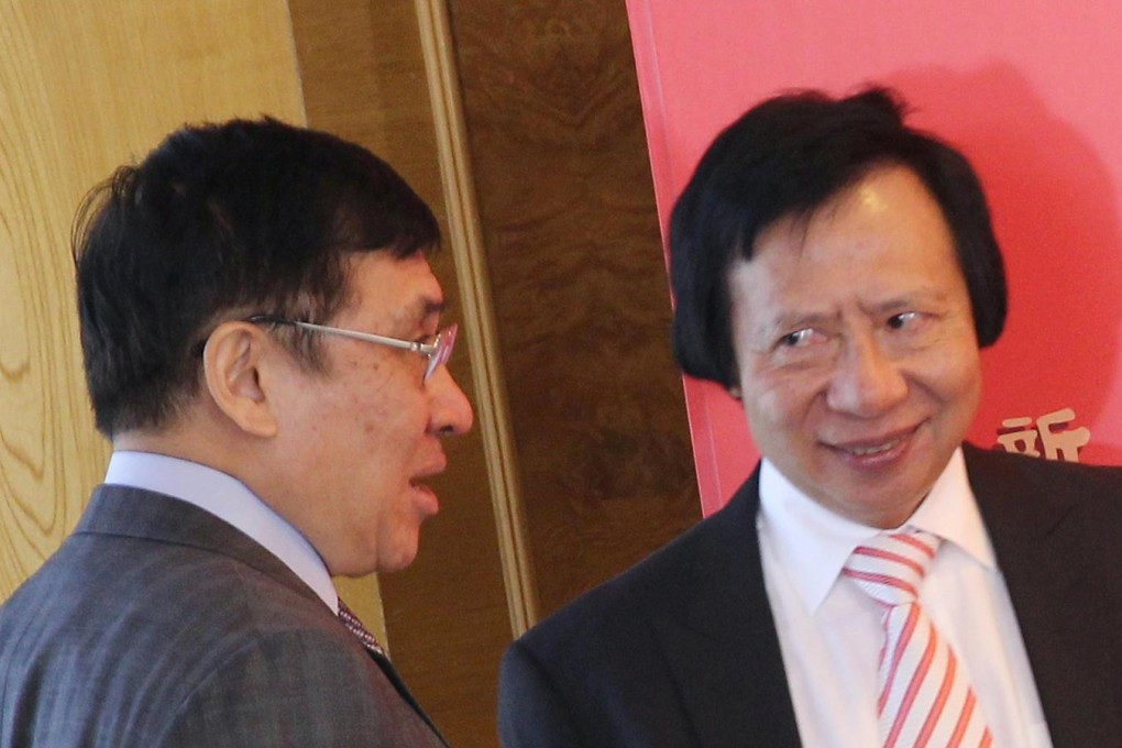 Raymond (left) and Thomas Kwok at the AGM. Photo: Edward Wong