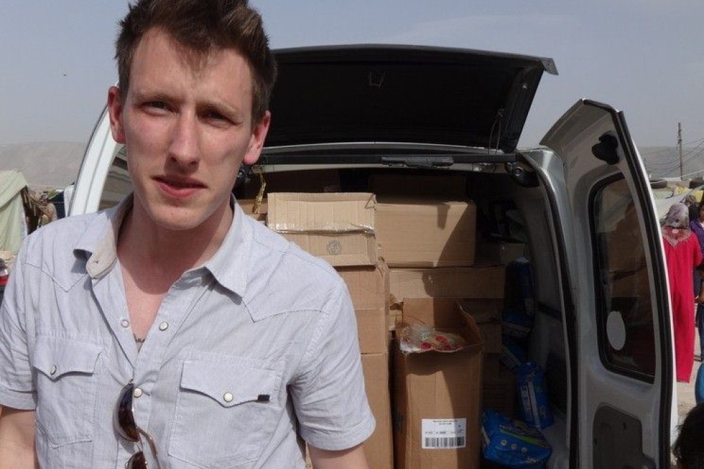 Peter Kassig somewhere along the Syrian border between late 2012 and fall 2013 while delivering supplies to refugees. Photo: AFP
