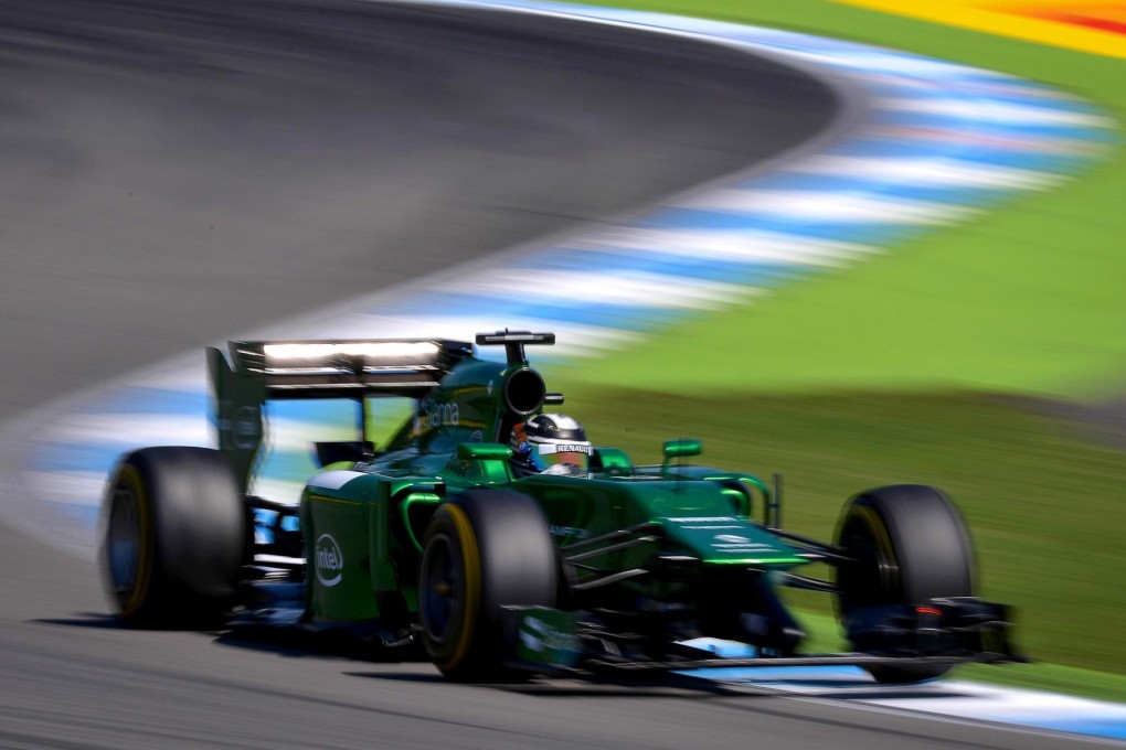 Kamui Kobayashi will return to race at Abu Dhabi. Photo: EPA