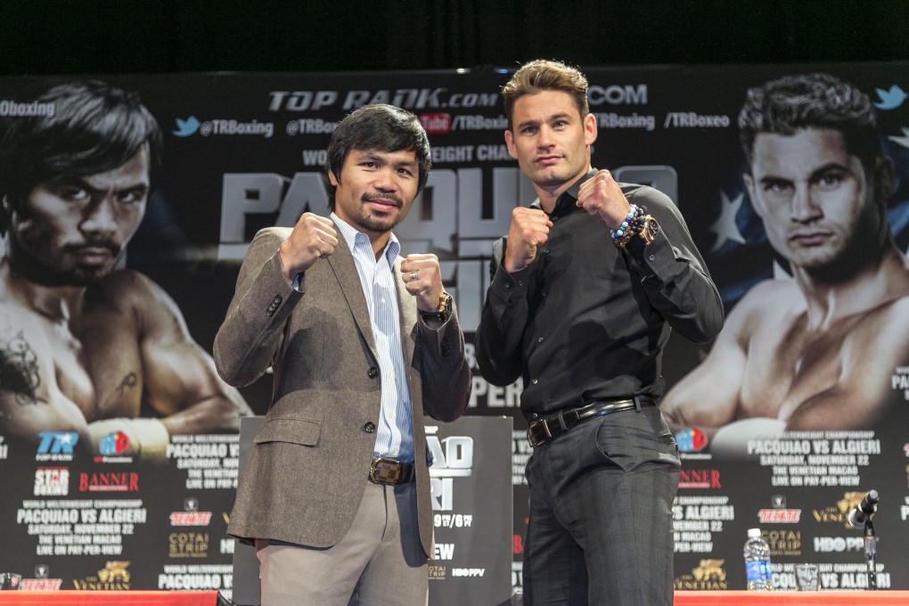 Rivals Manny Pacquiao and Chris Algieri square up at a press conference in Los Angeles. Photo: AP